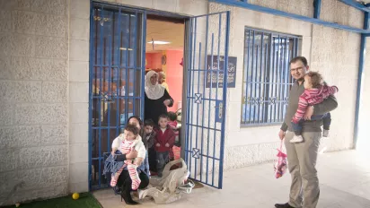 Female care workers provide childcare services in Amman, Jordan