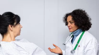 Doctor consults with a patient at a hospital