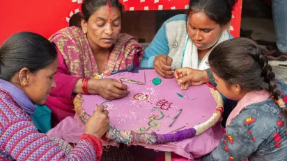 Group of women doing hand embroidery