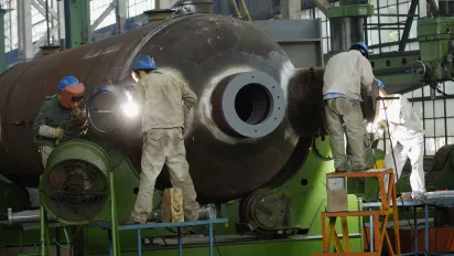 Welders at Hangzhou Boiler Group Co., China.